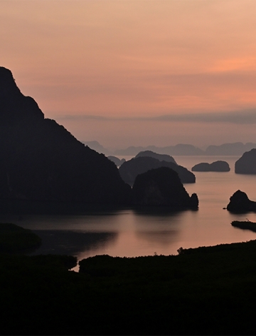 The expansive, breathtaking 180-degree view of Phang Nga Bay offers more than just a scenic sight